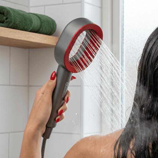 Shower head with mineral filter